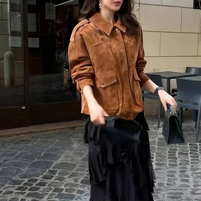 Women's suede-look polyester coat in bright brown colour with regular sleeves on mannequin