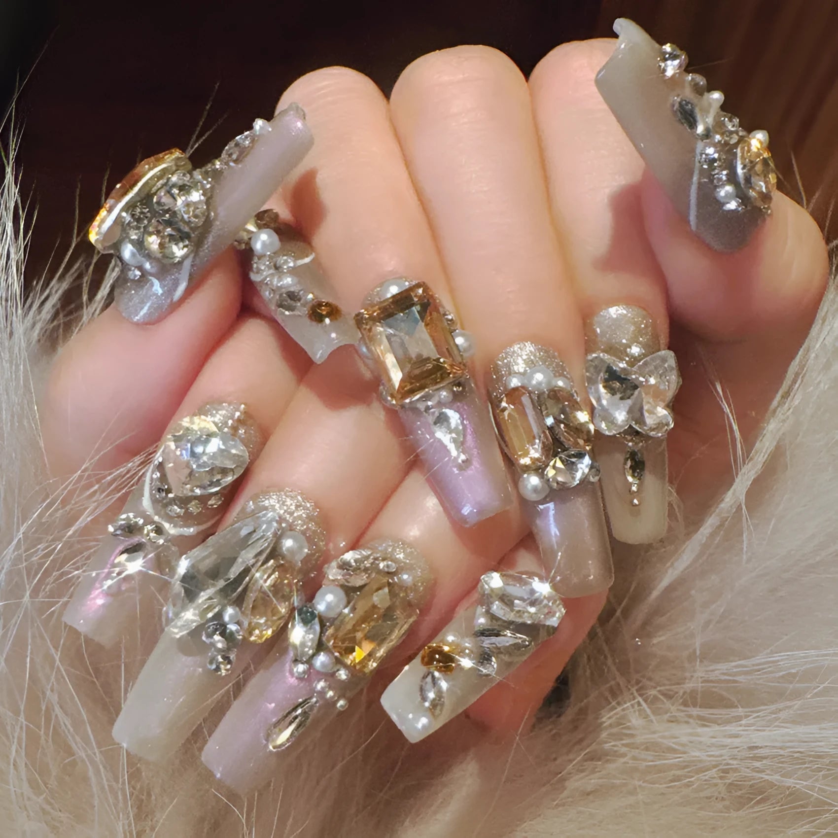 Rhinestone decorated false nail patches on card, with choice of jelly adhesive or tool set.