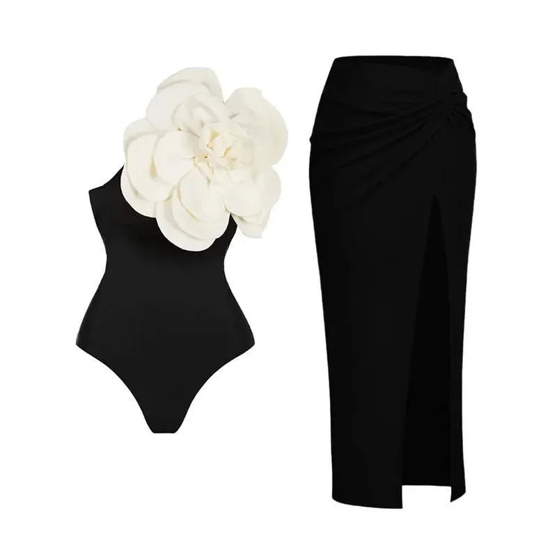 Women's black one-piece swimsuit with three-dimensional white floral pattern, showcasing European/American fit.