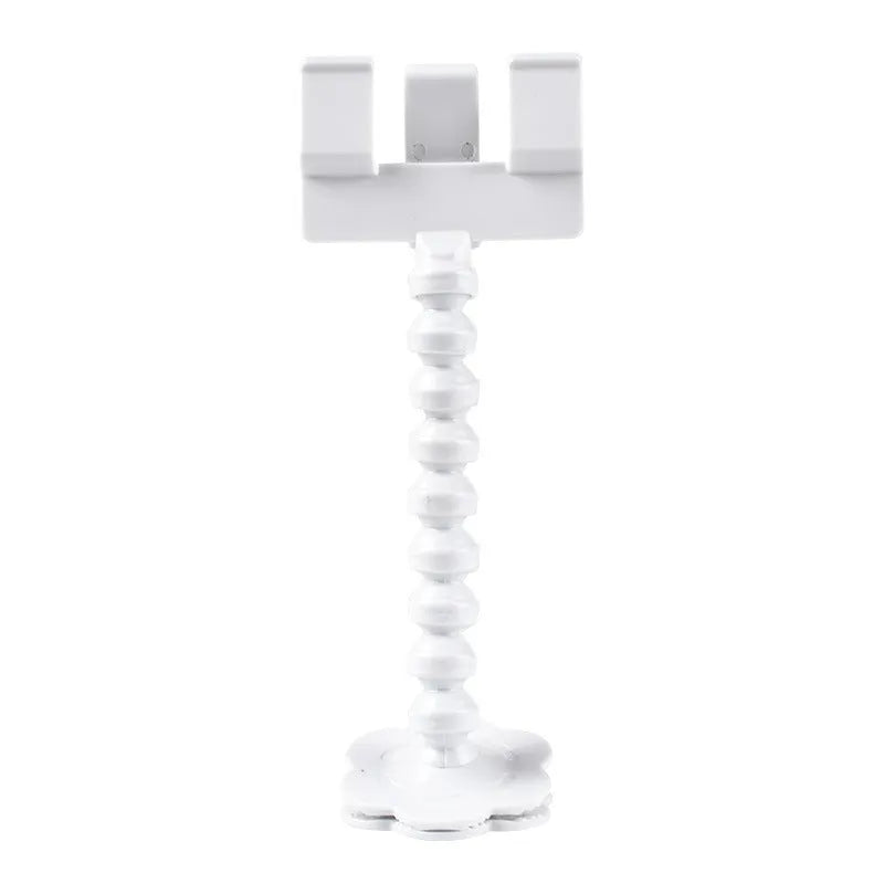 Black pet photography clip with rotating treat holder attached to mobile phone