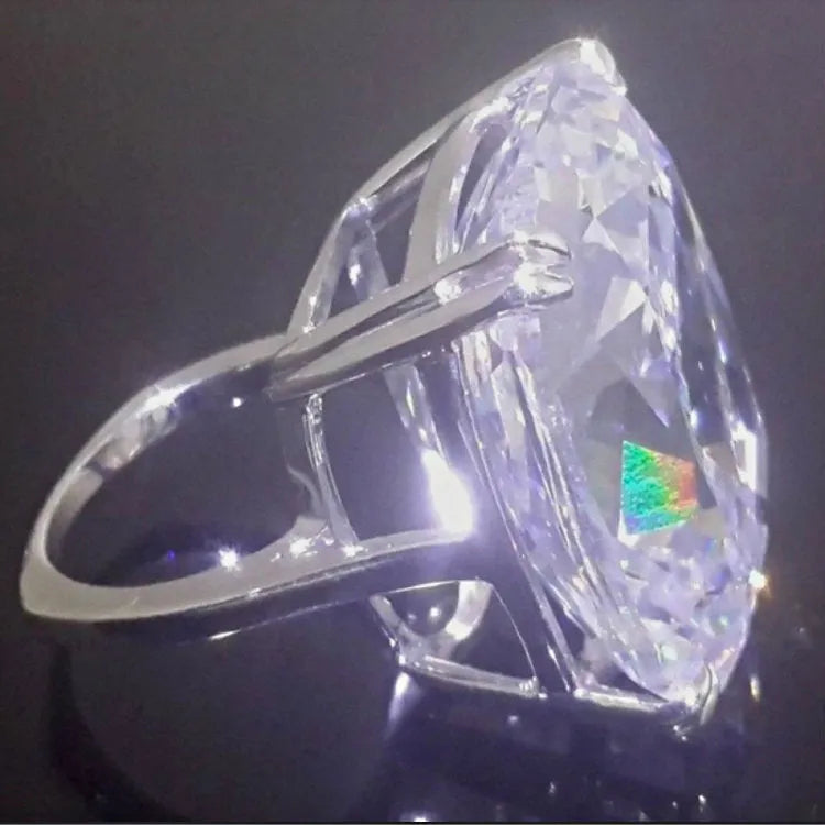 Women's white gold colour square ring with geometric design and inlaid diamond detail