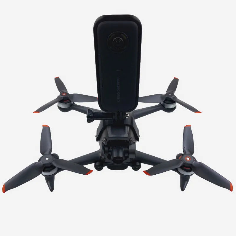 3D printed hard plastic FPV drone expansion bracket for GoPro cameras with a soft sponge pad.