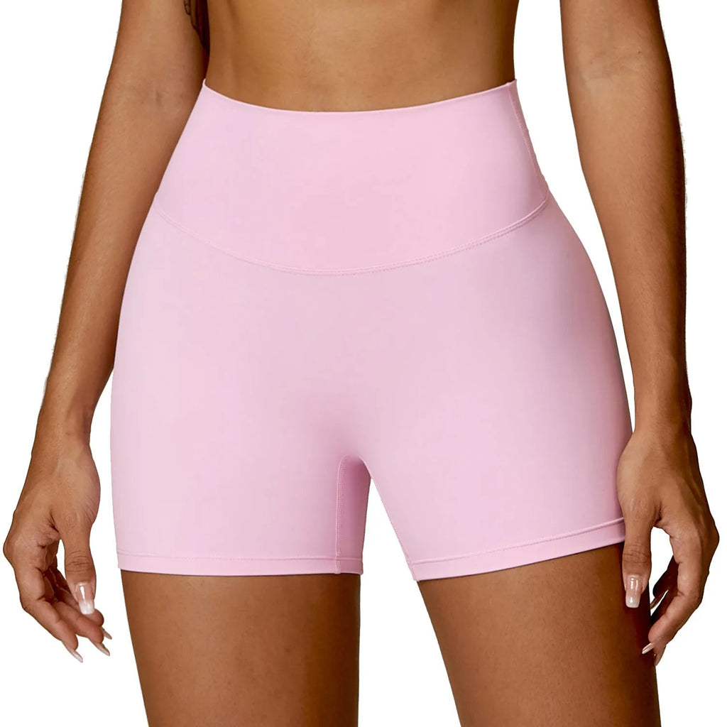 Women's high waist nylon yoga shorts in basil green colour on a mannequin.