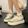 Green women's casual flat shoes with PU mesh upper and round toe design on flat heel