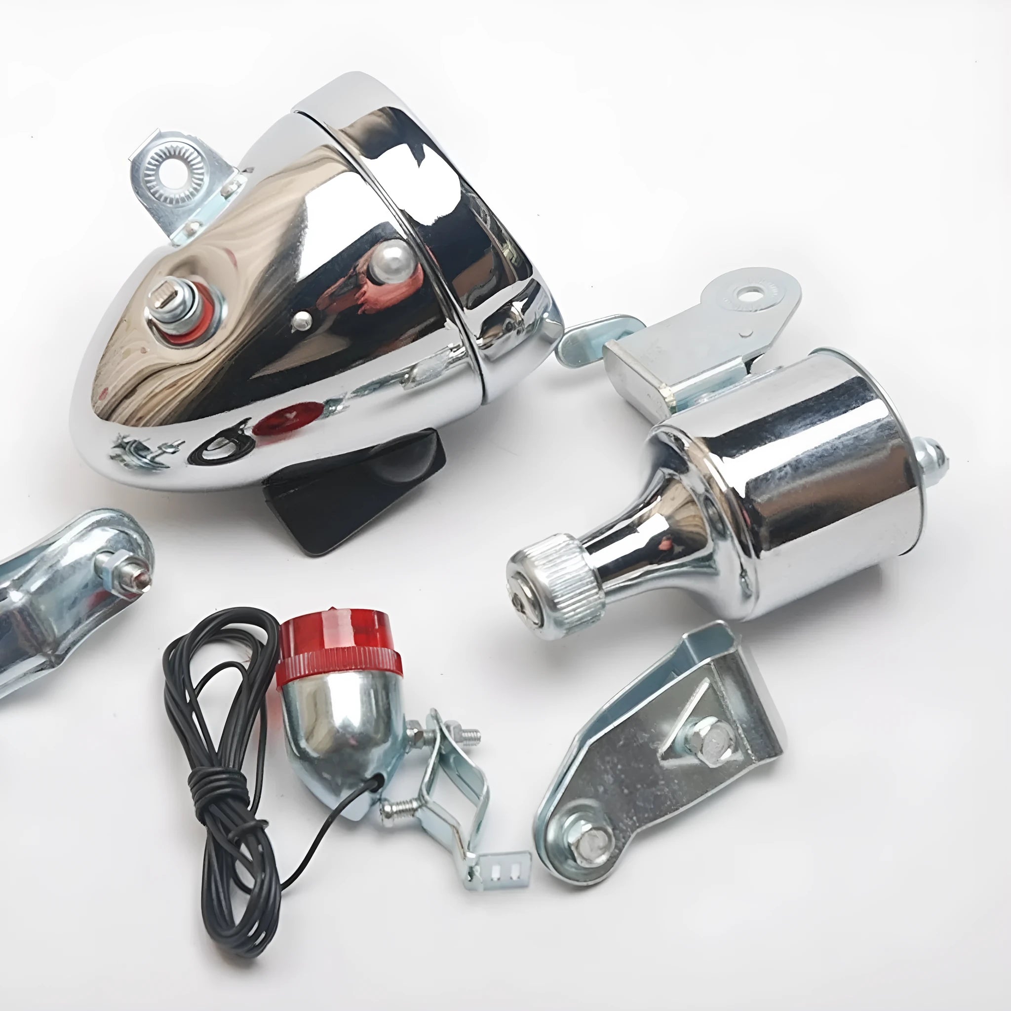 Silver bicycle dynamo generator light mounted on bicycle frame for friction-powered front and rear illumination