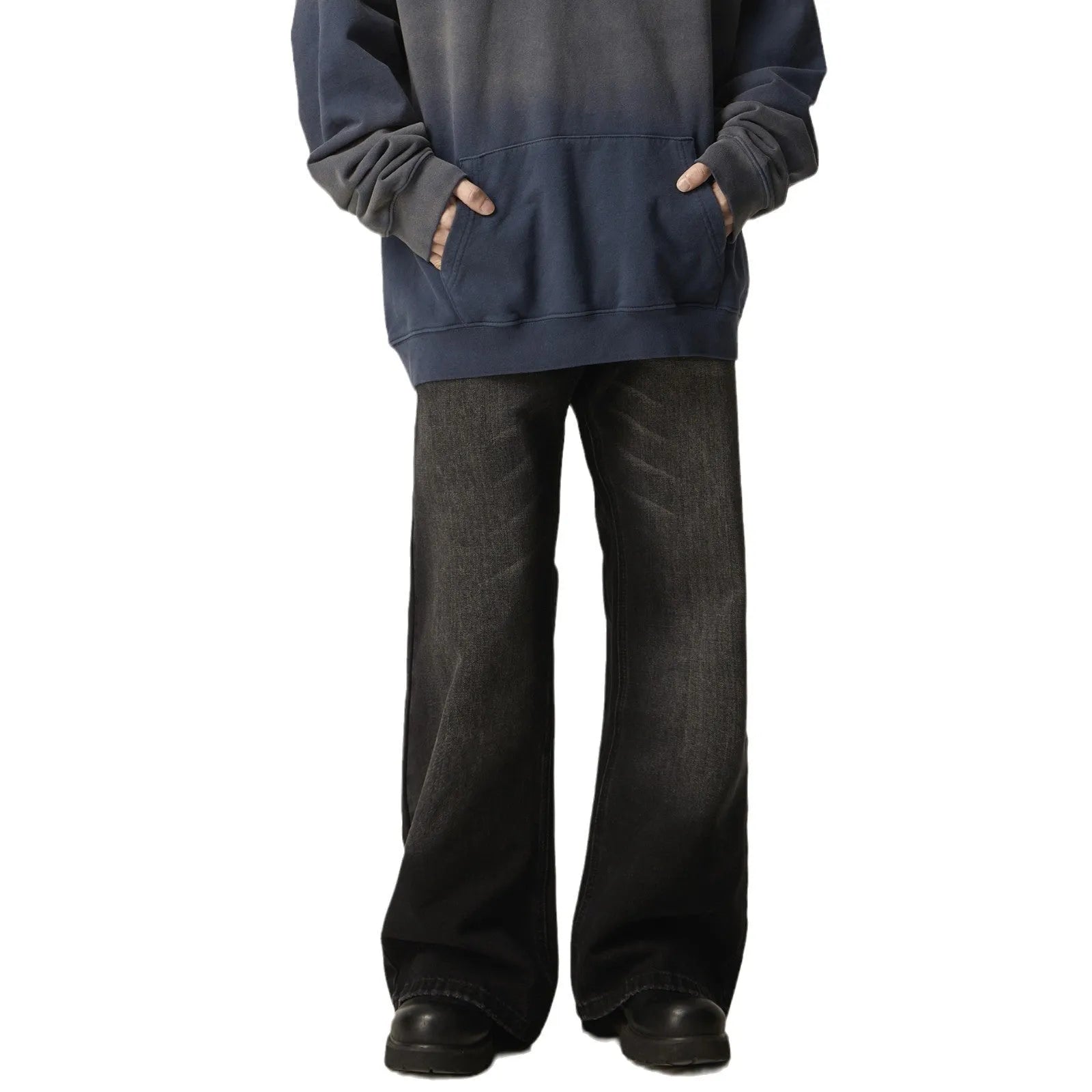 Black loose fit straight leg retro jeans on a hanger, showing zipper fly and relaxed silhouette.