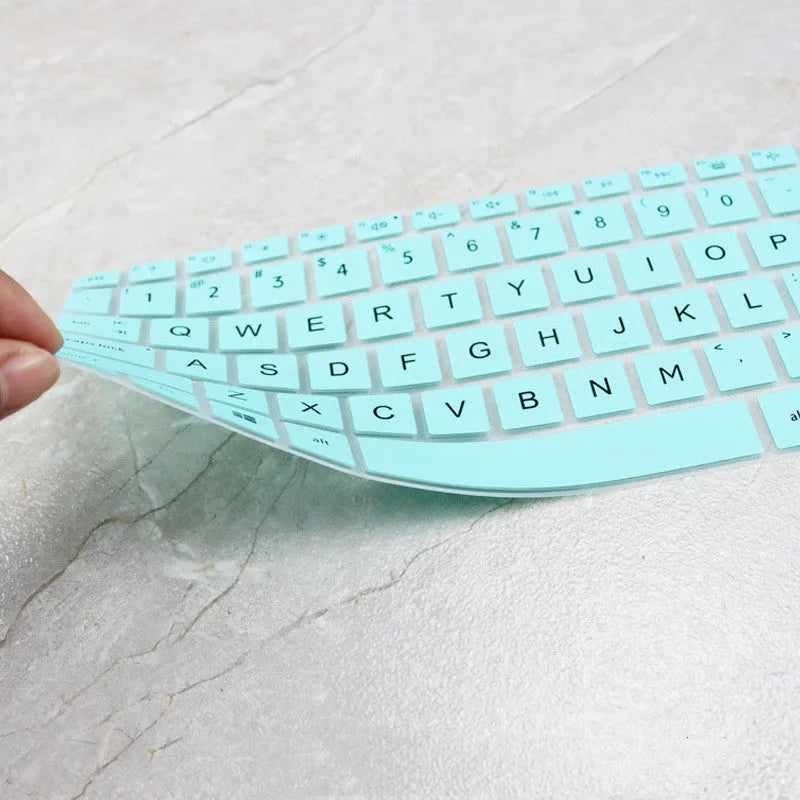 Silicone protective cover for HP 15 fingerprint edition laptop in translucent white showing snug fit over lid