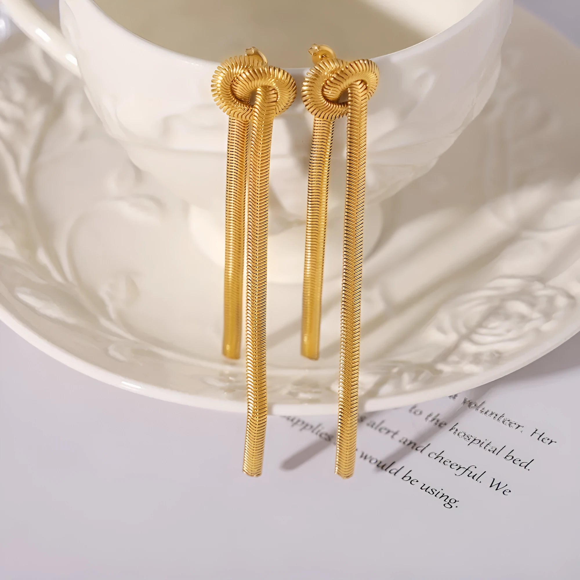 Gold electroplated titanium steel necklace with snake chain and tassel pendant with matching earrings jewellery set