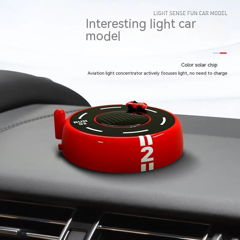Round modern car model air freshener decoration in black, with solar panel and USB port.