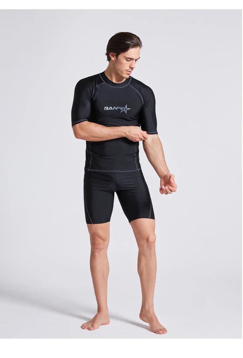 Men's blue quick-drying half sleeve nylon swimsuit set with swim top and pants for snorkelling