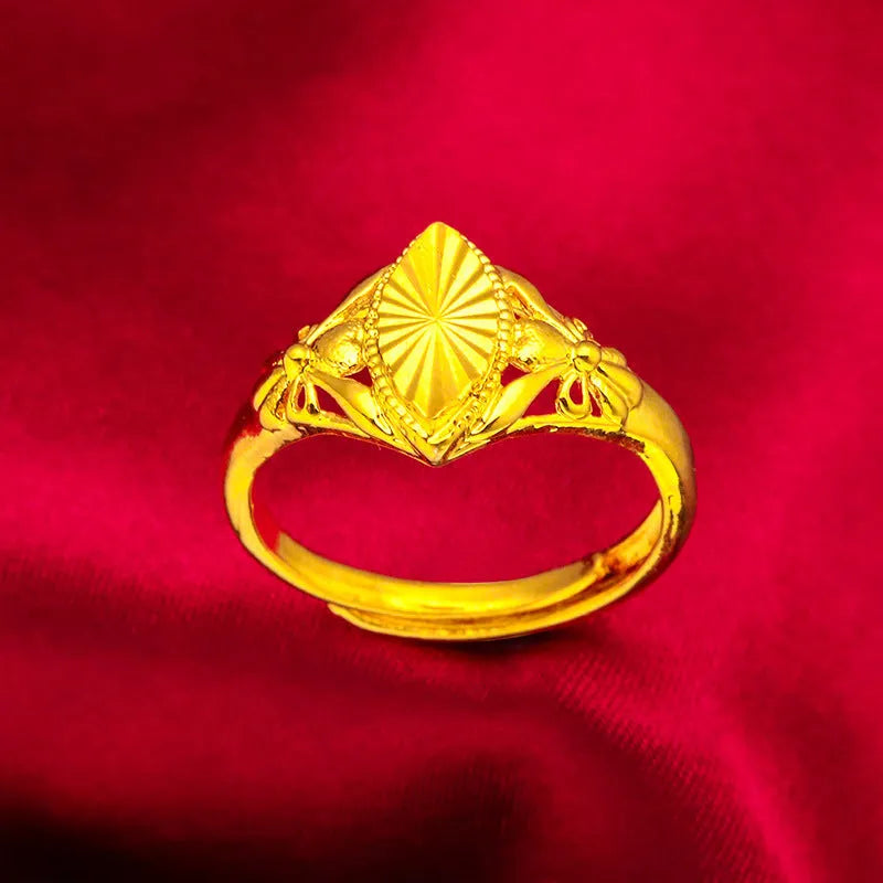 Gold geometric open flower ring with textured surfaces, brass construction with electroplating