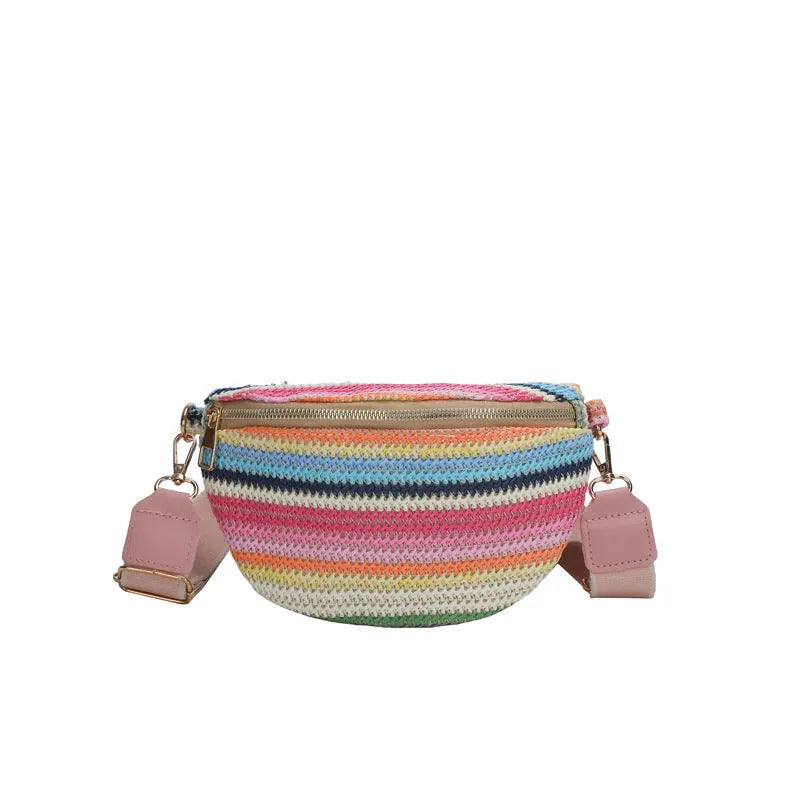 Blue bohemian style straw beach bag with single shoulder strap showing sandwich pocket design