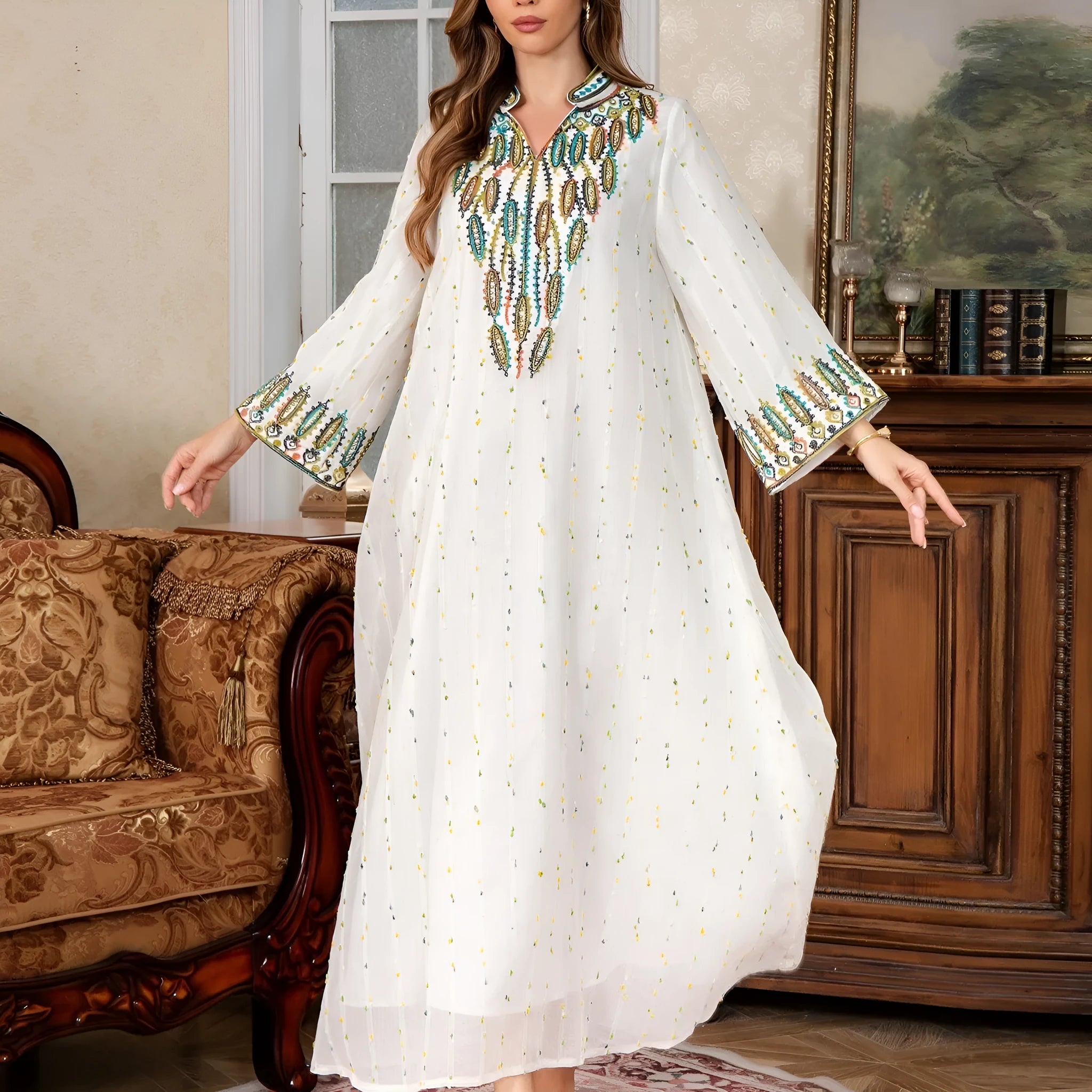 White Dubai-style Arabic robe with long sleeves and full-length skirt for women