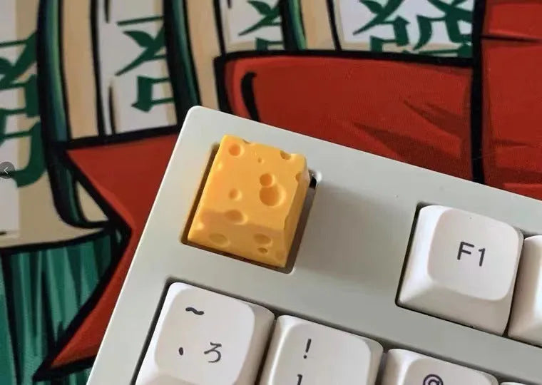 Yellow resin cheese artisan keycap for mechanical keyboards with 3D sculpted design