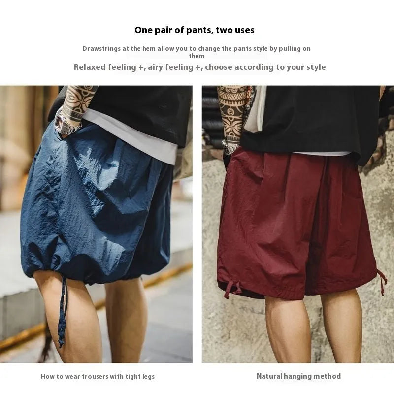 Men's loose fit beach shorts with embroidery in Prussian blue colour