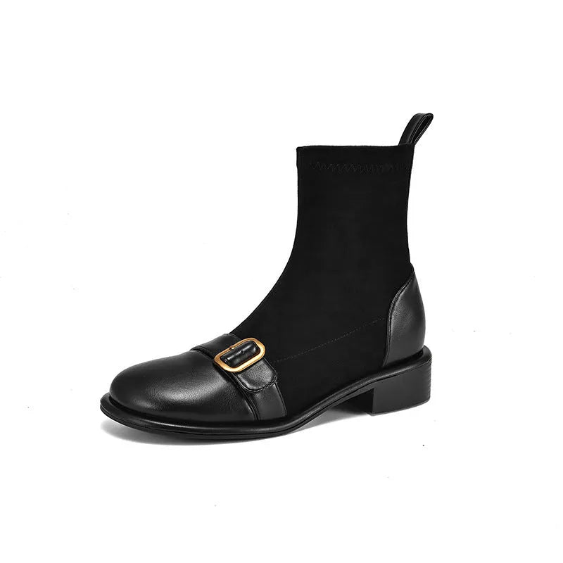 Women's black low heel Martin boot with front lace-up and silver ankle buckle on a round toe.
