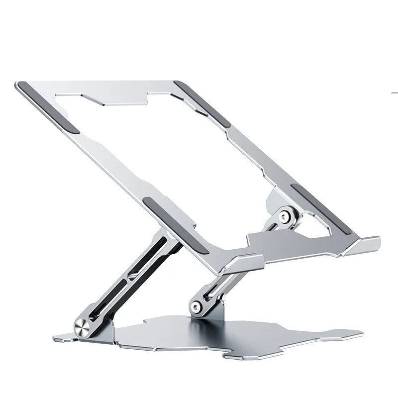 Grey aluminium adjustable laptop stand holding a silver laptop on a wooden desk.