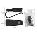 Black plastic multifunctional clip for car sun visor to hold sunglasses, tickets, and ID cards.