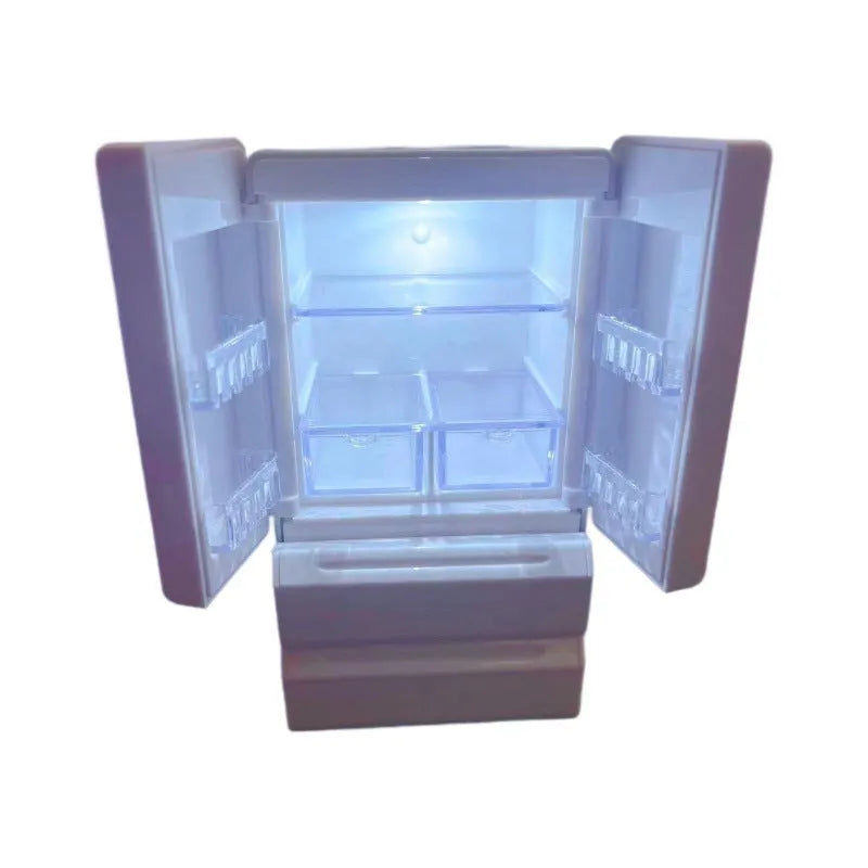 White plastic miniature candy toy model with light-up feature displayed on surface