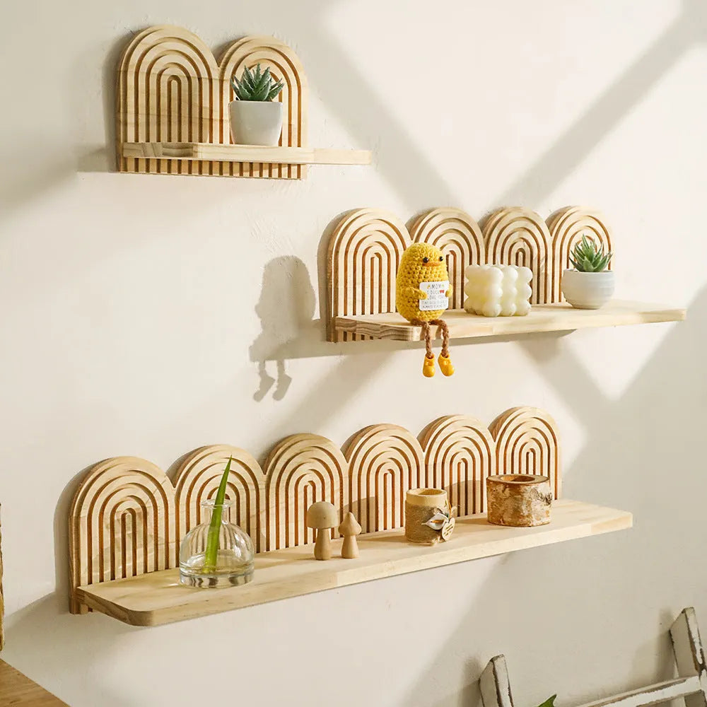 Wooden multi-layer wall storage rack holding potted plants on horizontal shelves