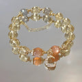 14K gold electroplated crystal bracelet with citrine moon stone and diamond-shaped charms in Chinese style