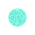 Round silicone pet licking mat with suction cup in blue colour on a floor