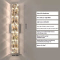 Crystal wall lamp with stainless steel base in chrome finish, LED light source