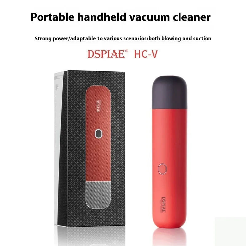 Portable desktop nozzle dust and debris cleaner handheld vacuum on desk surface