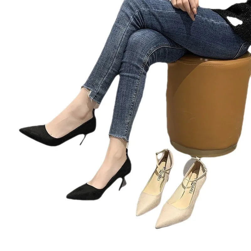 Women's black and white stiletto heel pump shoes with ankle buckle, showing 5cm and 8cm heel height options.