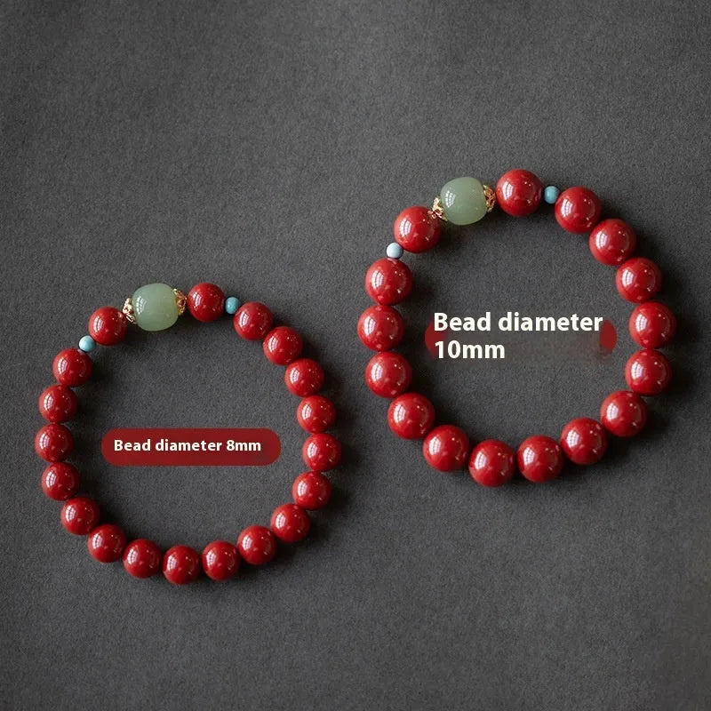 Purple Gold Sand cinnabar and Hetian jade bead bracelet with geometric ellipse shapes on a wrist.