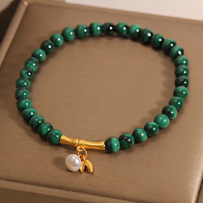 White crystal lucky bamboo bracelet for women, showing high-rise design on wrist.