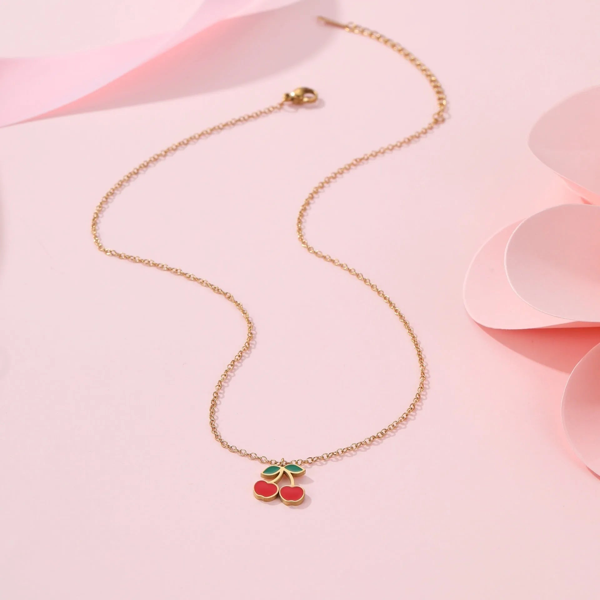 18K stainless steel cherry jewellery set with necklace, bracelet, earrings, and ring featuring geometric design