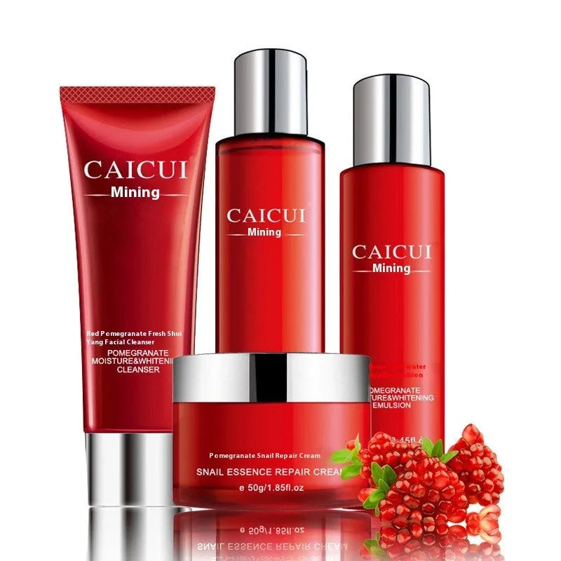 Pomegranate skincare set showing red bottles of face wash, toner, lotion, and facial cream.
