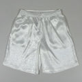 Man wearing black drawstring elastic waist Tai Chi practice shorts