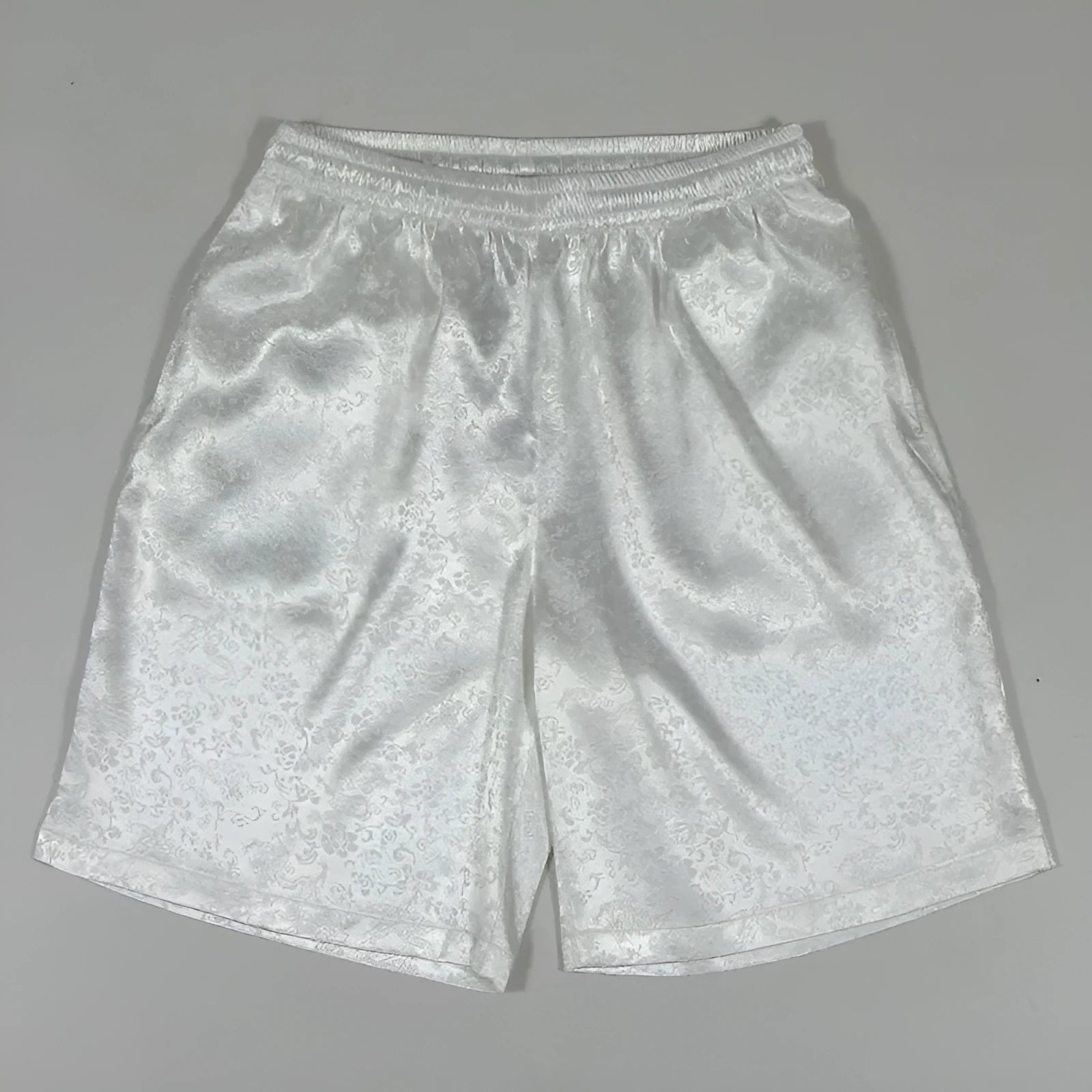 Man wearing black drawstring elastic waist Tai Chi practice shorts