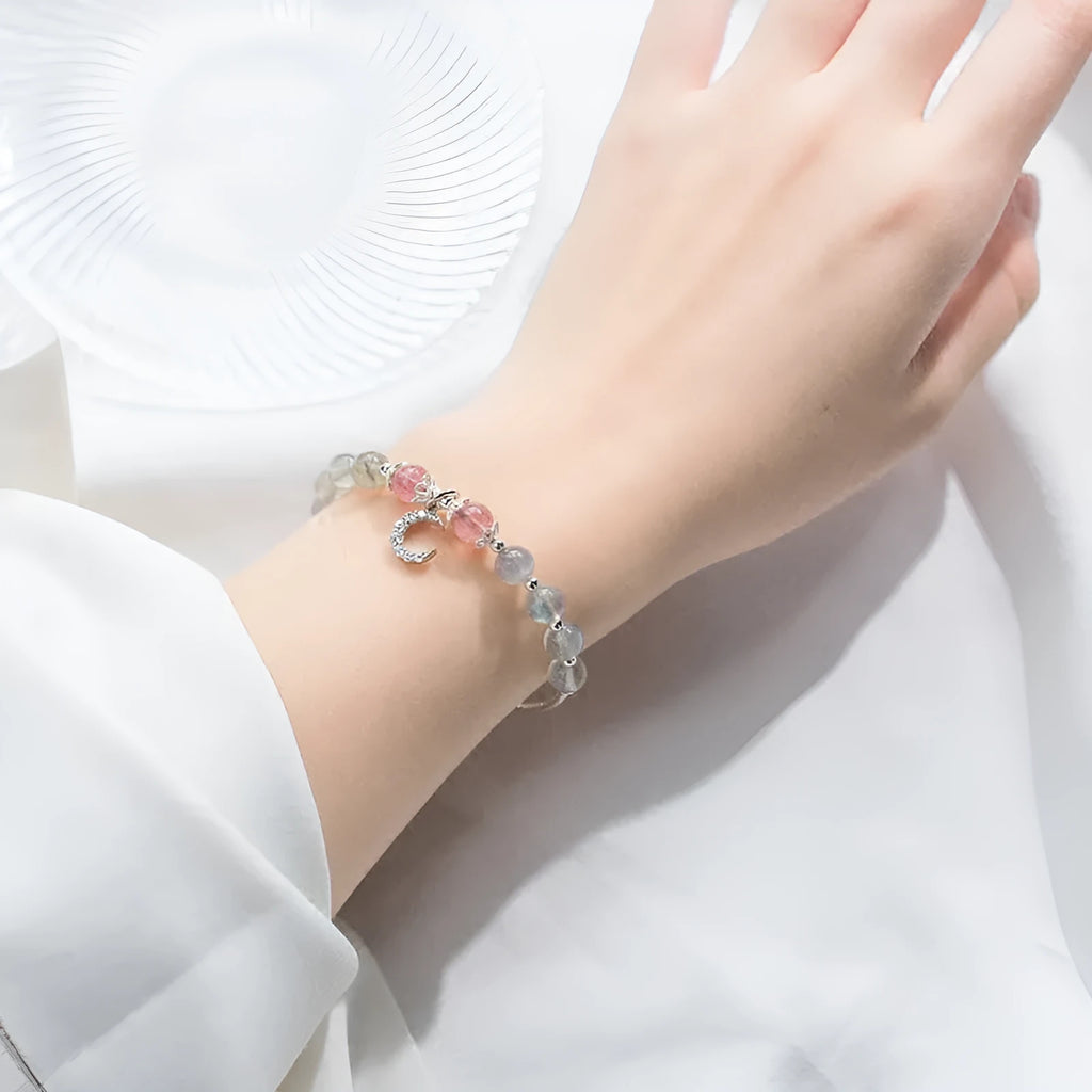 Natural moonstone bracelet with silver crescent moon charm and crystals on adjustable chain