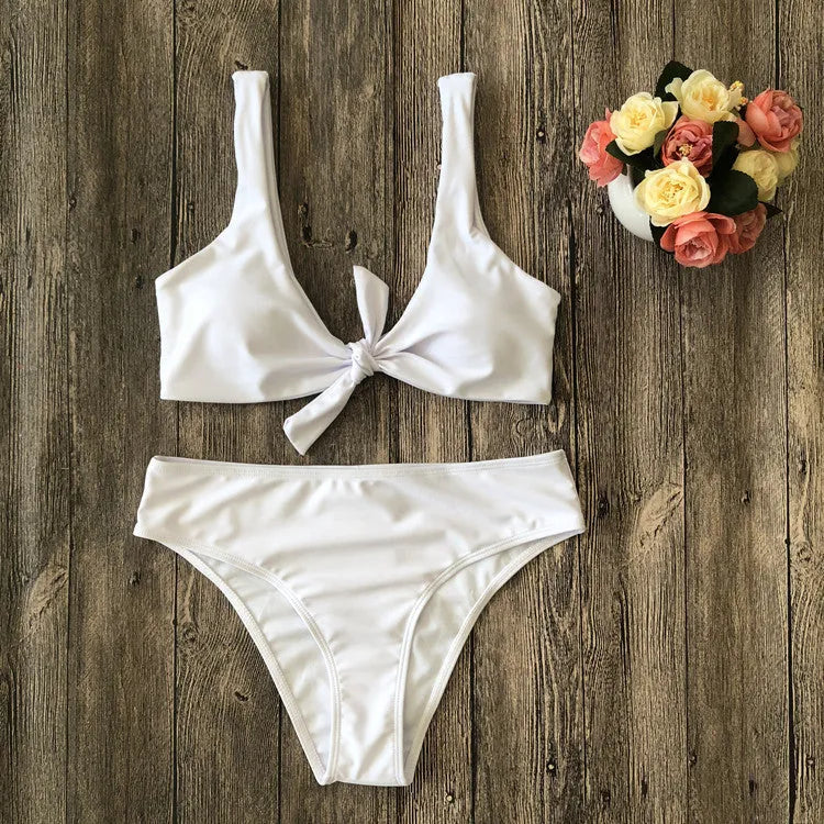 Women's solid colour bikini set in polyester, shown in one of five available colours.