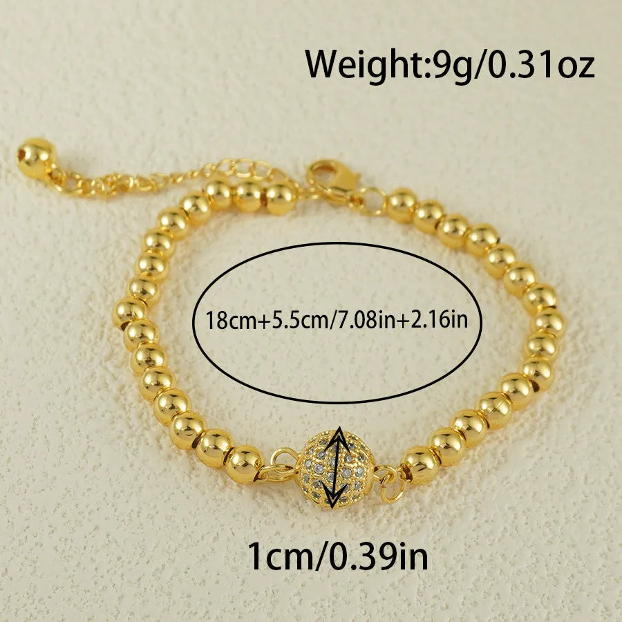 Women's heart-shaped copper bracelet with a single round zircon stone.