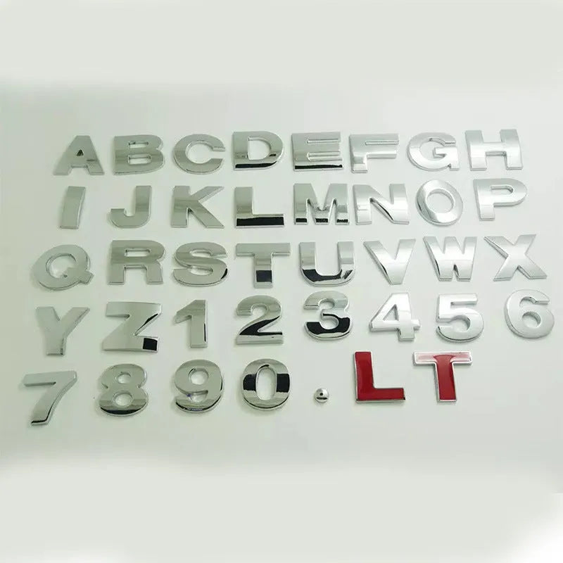 3D metal zinc alloy car bumper sticker showing a raised English letter on adhesive backing.