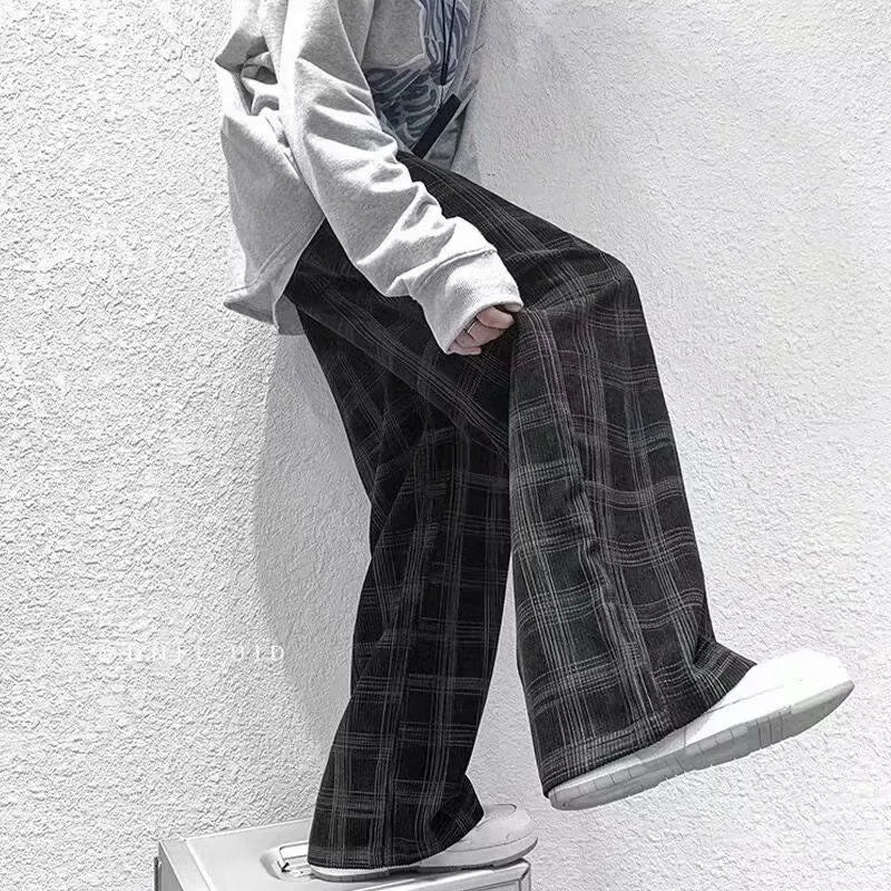 Men's black and green plaid pattern loose-fit straight-leg casual trousers on mid-waist