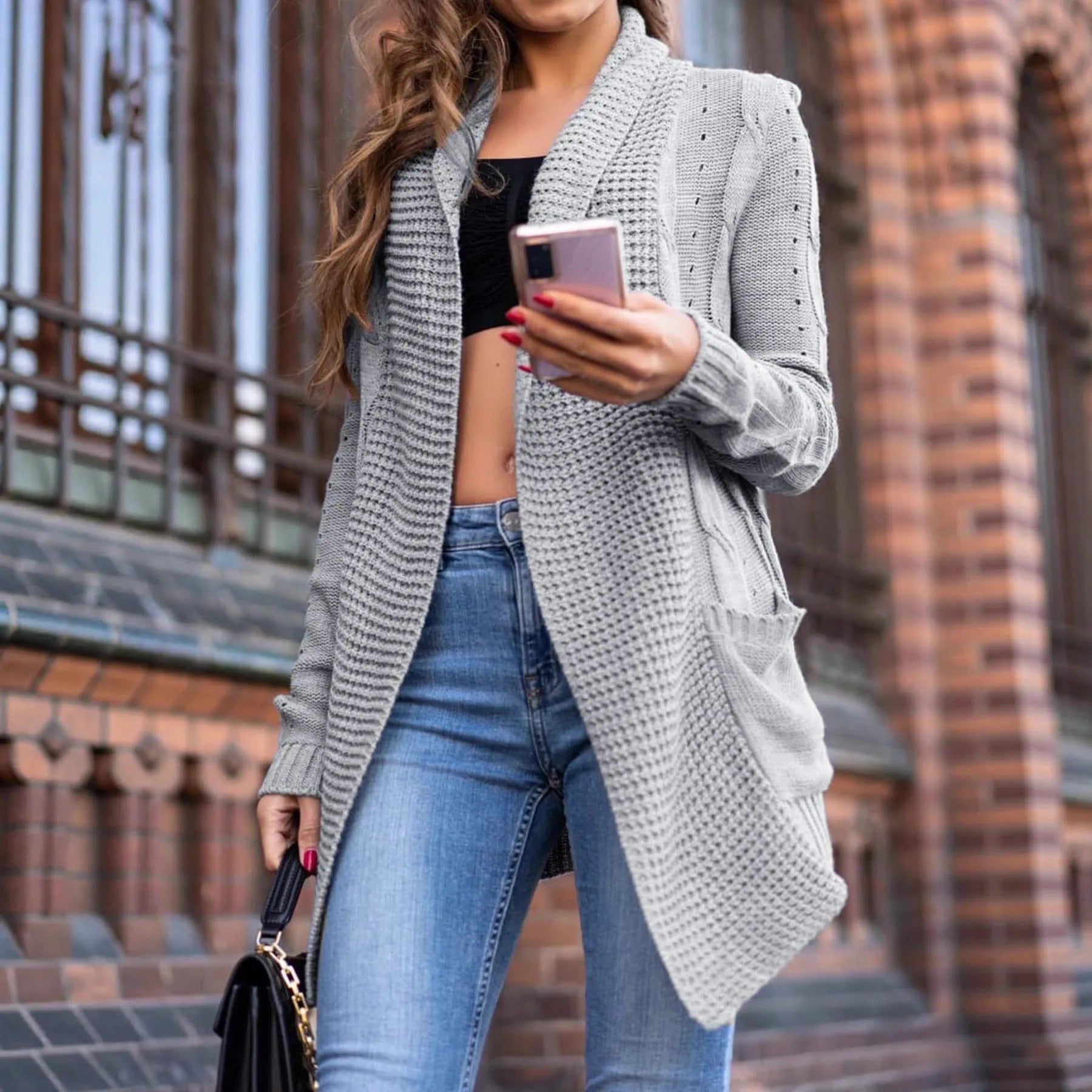 Grey women's loose-fit cardigan coat with long sleeves and pockets, made from thick viscose fibre.
