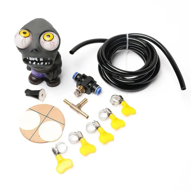 Adjustable turbo car boost eye doll ornament kit with pressure valve, copper tube, and mounting clips on a white background.