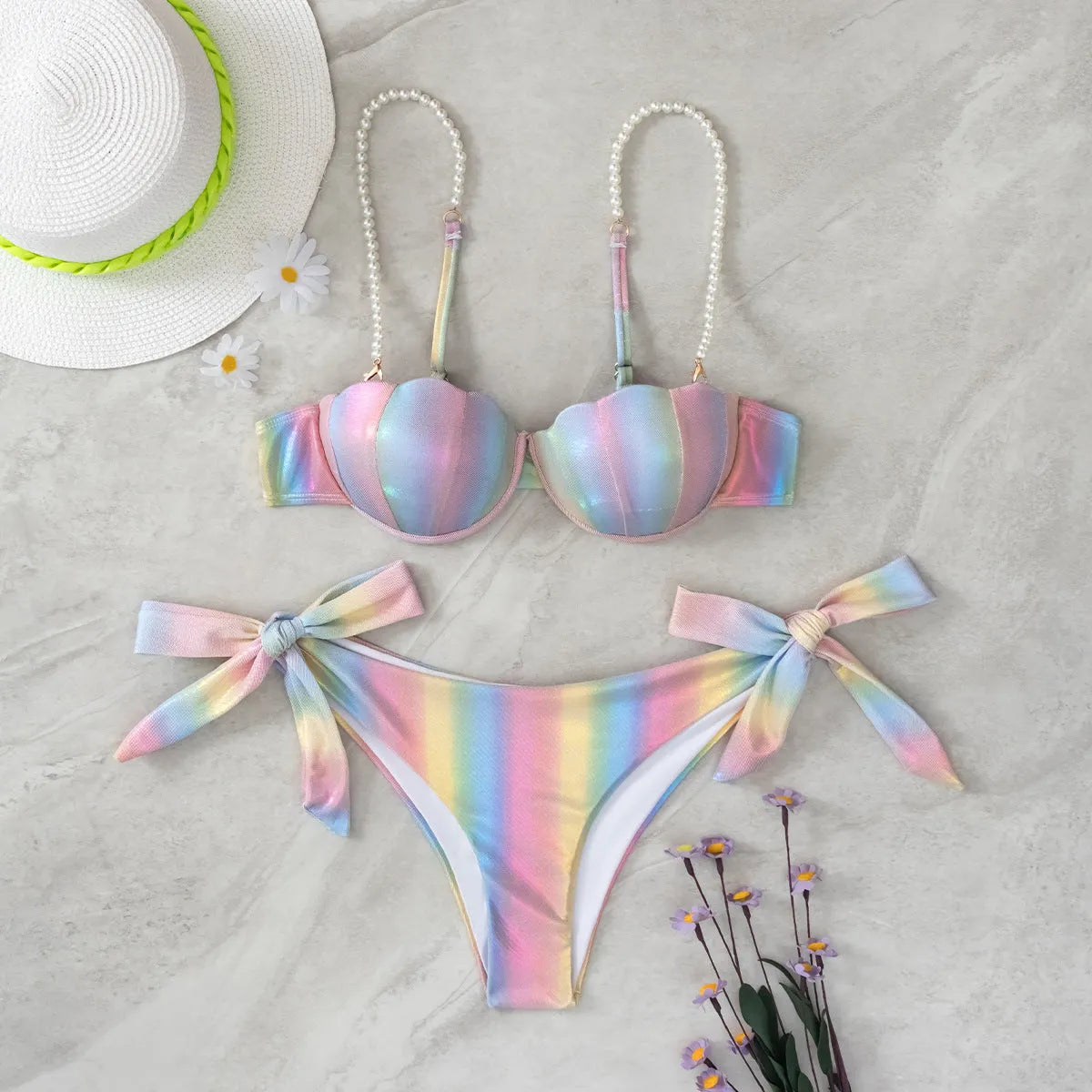 Women's rainbow split tied bikini swimsuit made from polyester fabric.