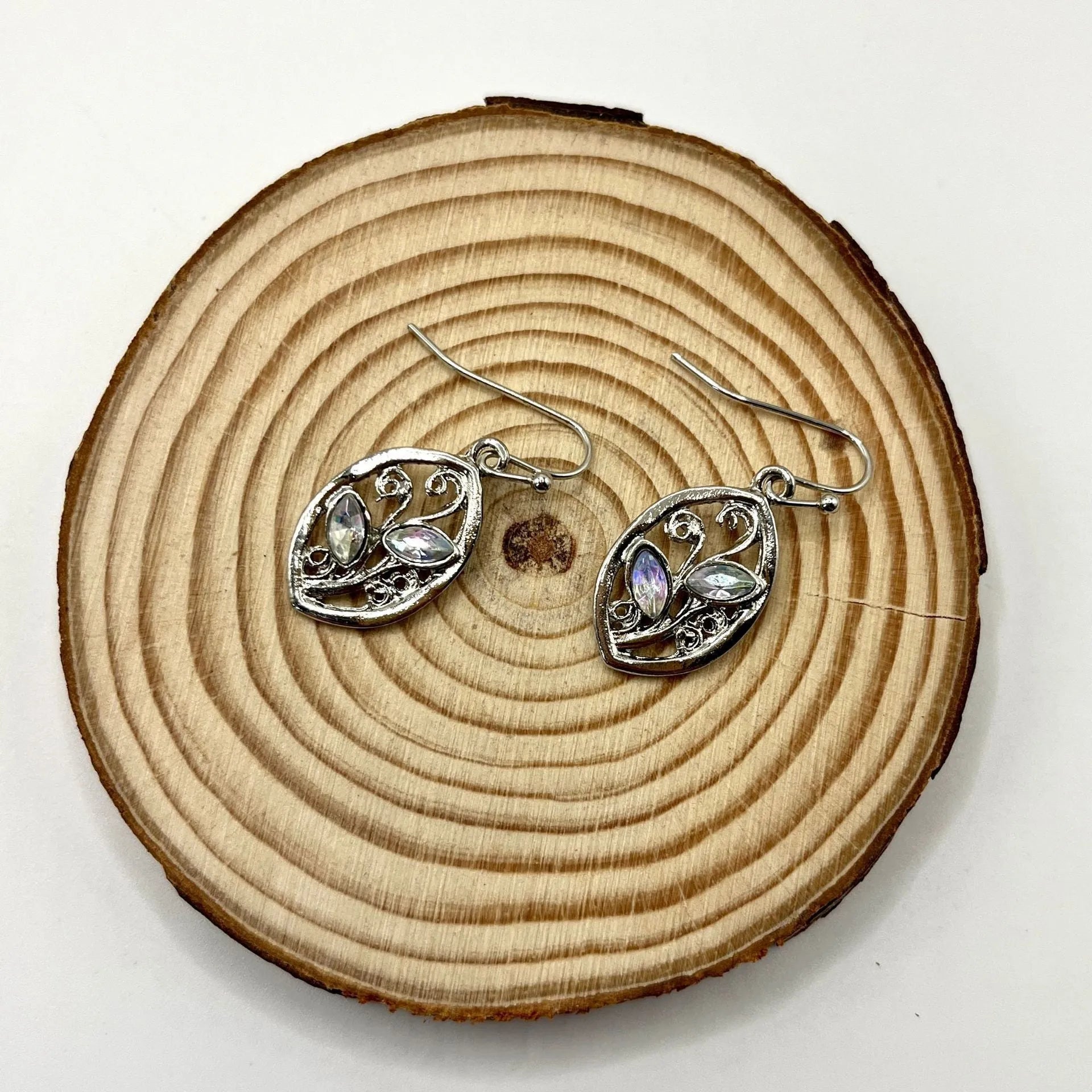 Women's creative leaf design earrings with embedded colourful moonstones in silver alloy setting