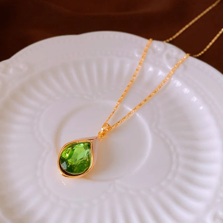 Real gold electroplated water drop-shaped earrings with inlaid zircon and crystal pendant