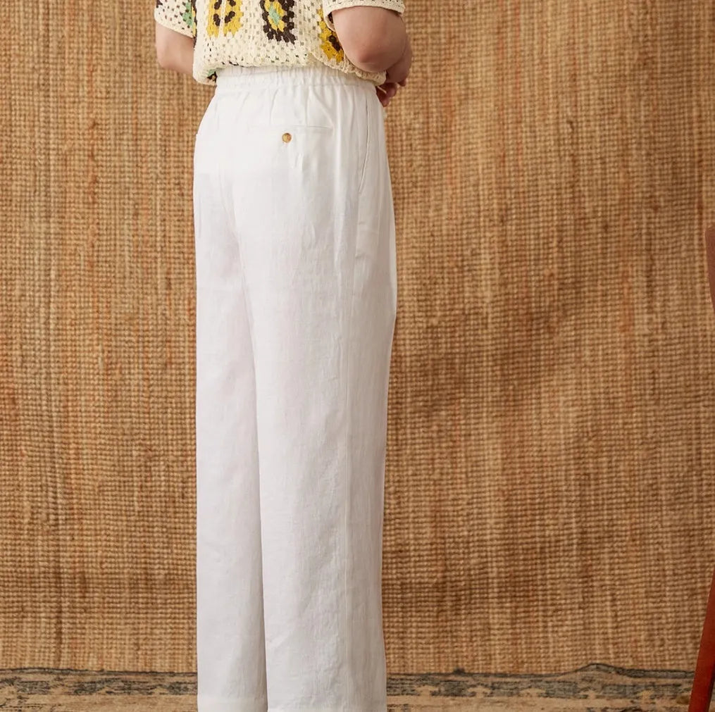 Women's straight-leg linen trousers in greige with an elasticated high waistband.