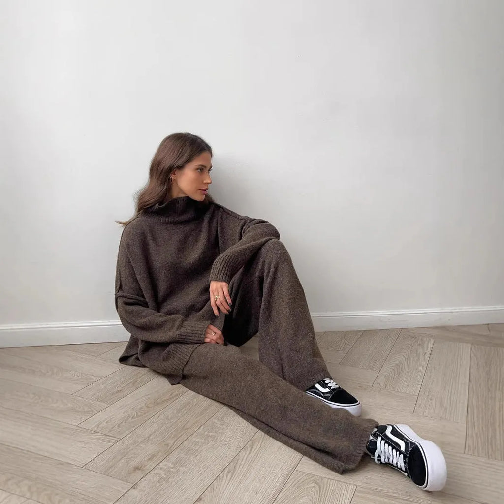 Women's acrylic fabric suit with side-slit sweater and matching trousers in solid colours