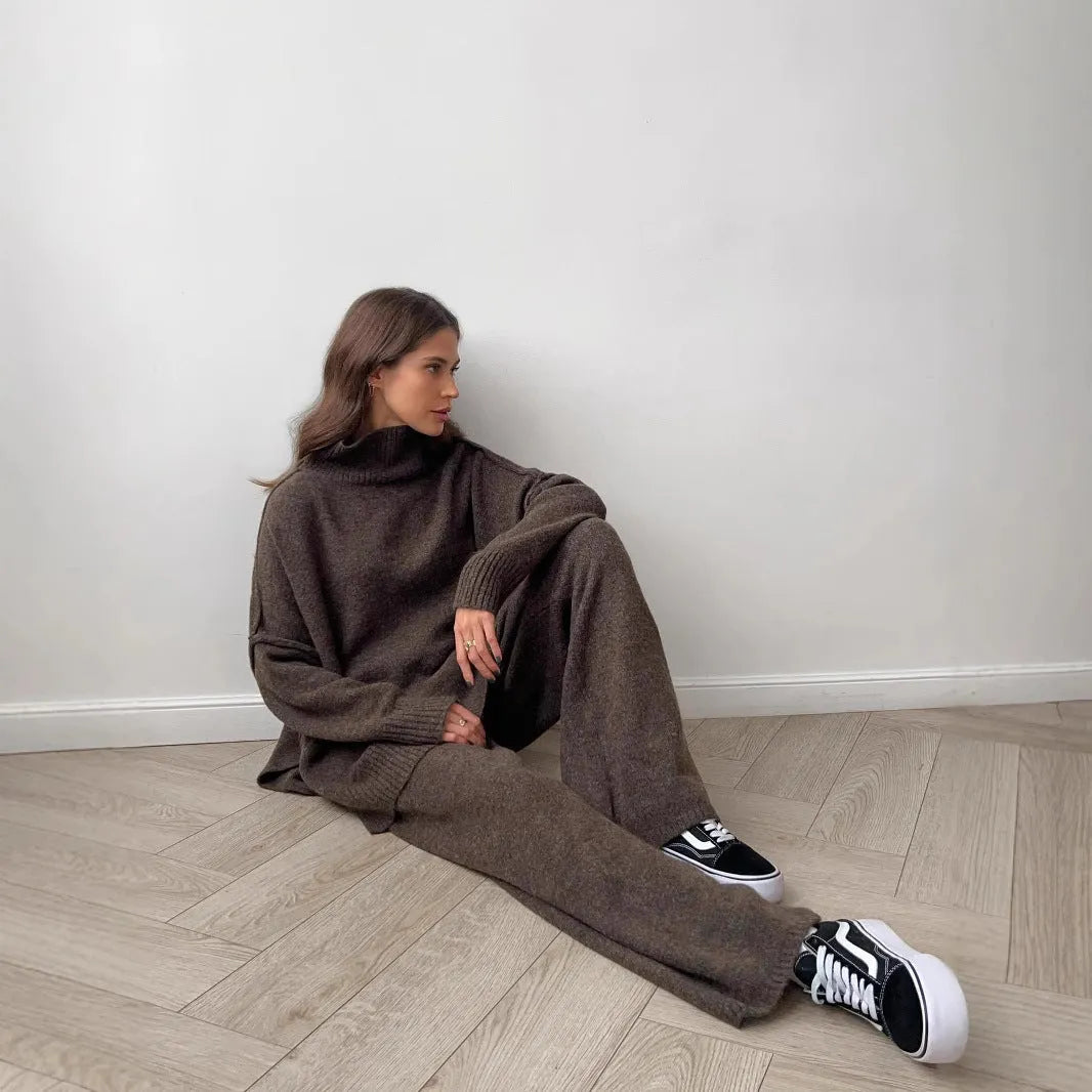Women's acrylic fabric suit with side-slit sweater and matching trousers in solid colours