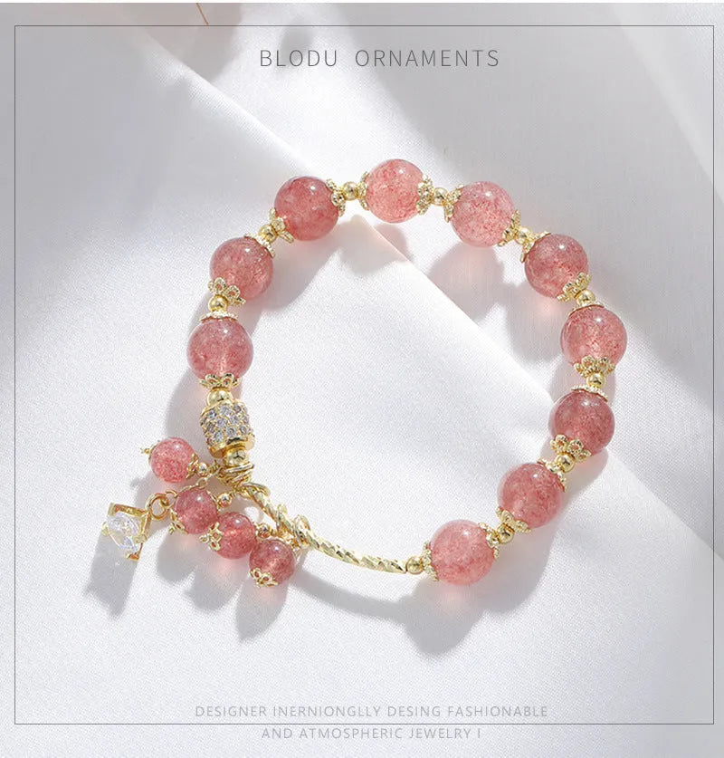 Pink strawberry quartz crystal bracelet with heart shape and pearl accents