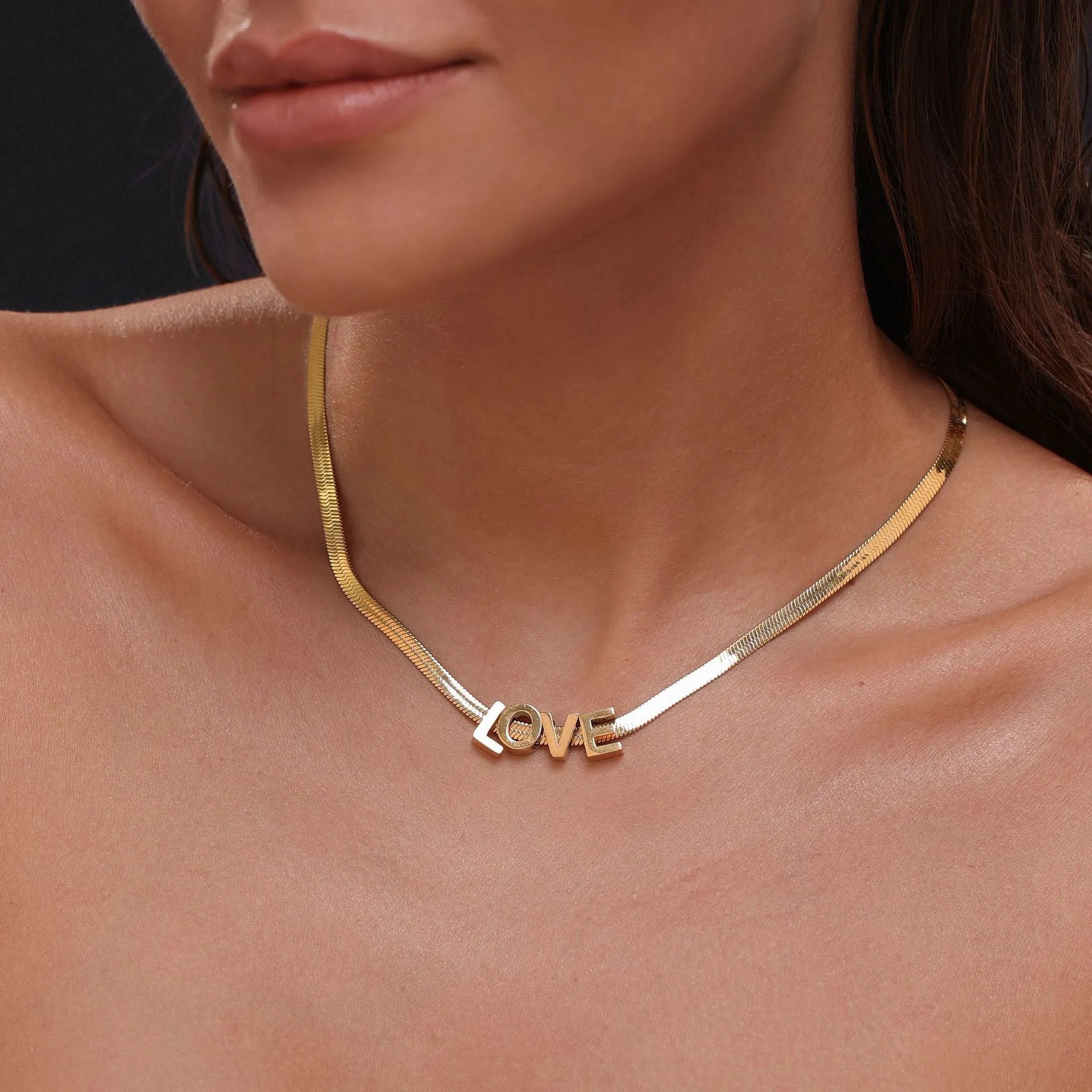 Personalised titanium steel necklace with a letter charm on a 40.5cm electroplated chain.